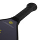 ProXR "The Story" 16 Pickleball Paddle highlights a forehand fiberglass face and backhand carbon fiber face. Black background with large ProXR logos on each side, white outline and details on the fiberglass side, with yellow outline on the backhand side.