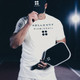 Pickleball player holding the midweight Holbrook Pro Series Mav Pro Carbon Fiber Paddle.