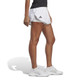 Side lifestyle view of Women's adidas Club shorts in the color White.