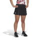 Front lifestyle view of Woman's adidas Club Pleatskirt in the color Black.