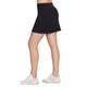 Side view of Women's Skechers GO WALK Wear Skort in the color Black.