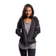 Front view of model posing with the Women's erne The Highland Windbreaker in the color Jet Black.