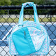 View of the Turquoise Born to Rally Born to Rally Pickleball Bag on the court!