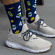 View of the Navy Born to Rally Born to Rally Bamboo Pickleball Socks on model.