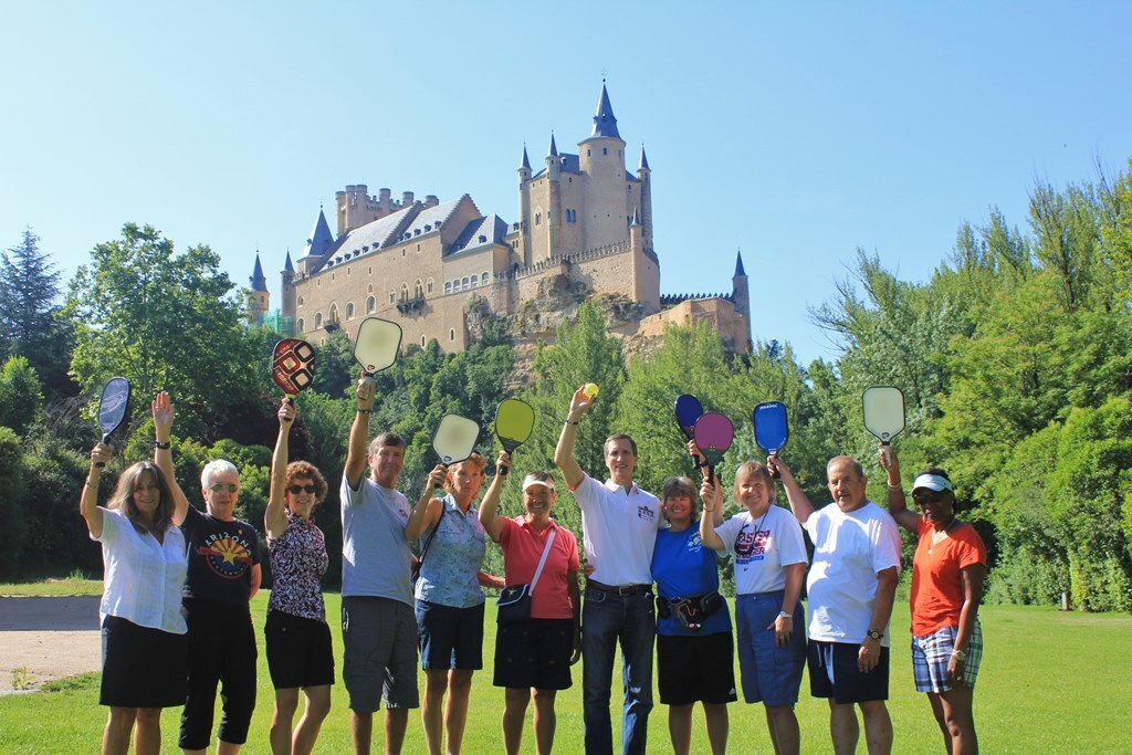 Pickleball travelers beneath the Alc&aacute;zar of Segovia in Spain