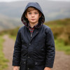 Boy wearing the kids game wax jacket with hood