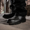 Farmer wearing Blackrock steel toe cap safety dealer boots showing durable leather upper