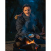 Man toasting marshmallows by open fire wearing the Hoggs of Fife Argyll II jacket