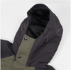 Adjustable storm hood on the Stoney Creek Tempest Jacket, designed to shield against heavy farmyard rain