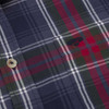 Close-up of Hoggs of Fife Taransay shirt fabric showing red, navyand green plaid twill check pattern for rural and shooting clothing