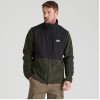 Model wearing Ridgeline Men's hybrid fleece jacket with cargo pants