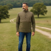 Man wearing Jack Pyke Snap Neck pullover whilst walking