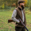 Men’s Deerhunter fleece waistcoat in olive worn for shooting in countryside