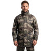 Man wearing Arctic Storm Orbit waterproof camouflage jacket for field sports and wet weather protection