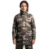 Woman wearing Arctic Storm Orbit waterproof camouflage jacket and trouser set
