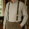 Farmer wearing labrador designed braces with a check shirt