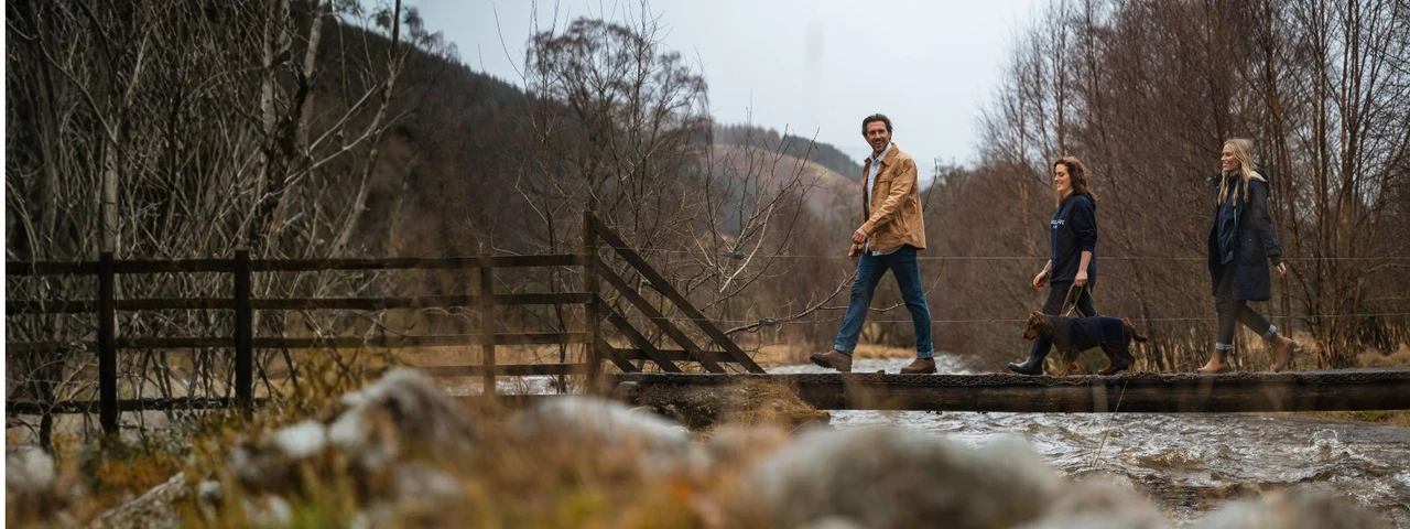 Dog walking clothing for spring days with practical jacket and lightweight walking footwear