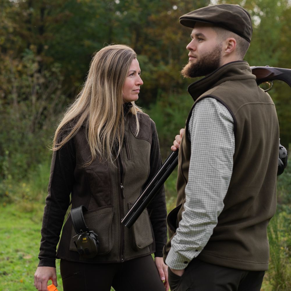 Deerhunter Eagle fleece waistcoat worn outdoors by shooters in woodland setting