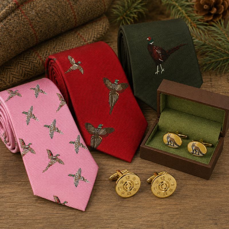 Shooting ties, tie pins and cufflinks arranged as gifts for game shooters