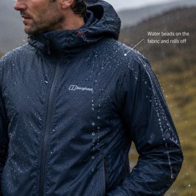 Water beading and rolling off a fully waterproof jacket
