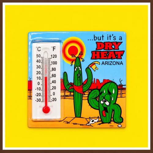 Arizona “But It’s a Dry Heat” thermometer magnet featuring a desert-themed illustration with a cactus and built-in thermometer.