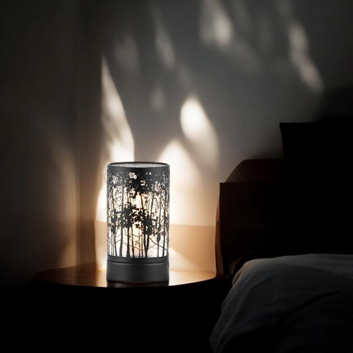 Black Morning Tree Touch Lamp in a dark room
