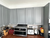 Painting the kitchen spraying the kitchen grey