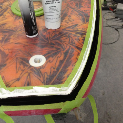 both-pinstripes-on-surfboard-before-pulling-tape.jpg