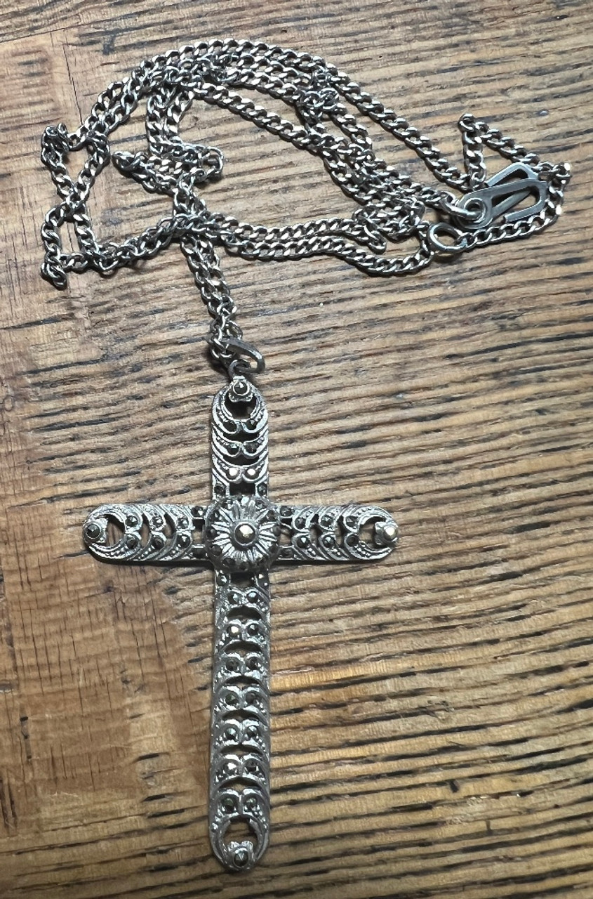 Large silver cross necklace with navy rhinestones