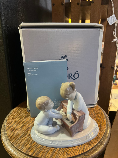 Lladró “First Melodies” 01008292 Porcelain Figurine w/ Box & Booklet