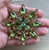 Vintage Hobe Attributed Olivine Green Rhinestone Gold Tone Snowflake Brooch