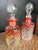 Antique Baccarat Perfume Bottle Pair w Stoppers Rose Tiente Cadmium Swirl 5.5”