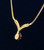 Vintage Garnet V-Bar Chevron Necklace 1970s Costume Unsigned Rich Gold Tone Jewelry