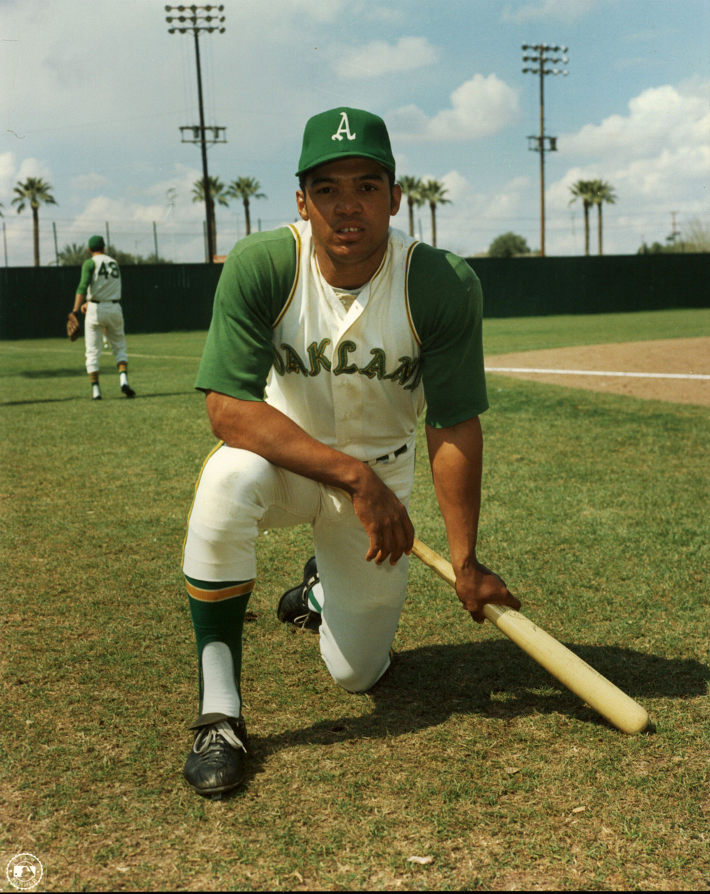 Athletics Reggie Jackson 8x10 PhotoFile Kneeling On Bat Photo Un