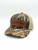 Gear up with the Winter Timber Outdoors Leather Patch Hat. Authentic Mossy Oak Shadow Grass camo built for waterfowl hunting and casual outdoor wear.