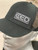CED Outdoor Cap Black Rubber Patch Modern Trucker