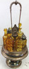 Vintage Amber Six Bottle Cruet Set with Silver Plated Holder