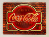 Coca-Cola Sign on Brick Wall by Michael Fishel