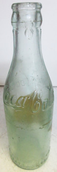 Original straight sided embossed Coca-Cola bottle with paper label circa 1900's