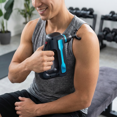 Customer Using Apex Pro Massage Gun