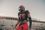 What Do the Stickers Mean on College Football Helmets?