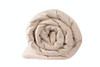 Sleep & Beyond myMerino Organic Wool Comforter Light Rolled Up