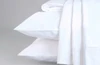 Sleep & Beyond 100% Organic Percale Sheet Set White Stacked With Cases