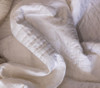 DreamFit Chill Innovations DreamChill Enhanced Bamboo Quilted White Sheet Set Scrunched