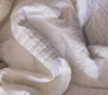 DreamFit Chill Innovations DreamChill Enhanced Bamboo Quilted White Sheet Set Scrunched