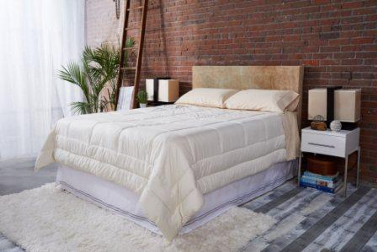 Sleep & Beyond myMerino Organic Wool Comforter Light On Bed Mattress