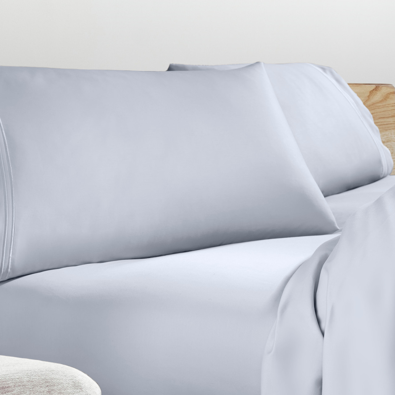 Refreshing TENCEL™ Lyocell Sheets by PureCare Split Head, Split Top, Flex Head Style Stacked Light Blue Bed