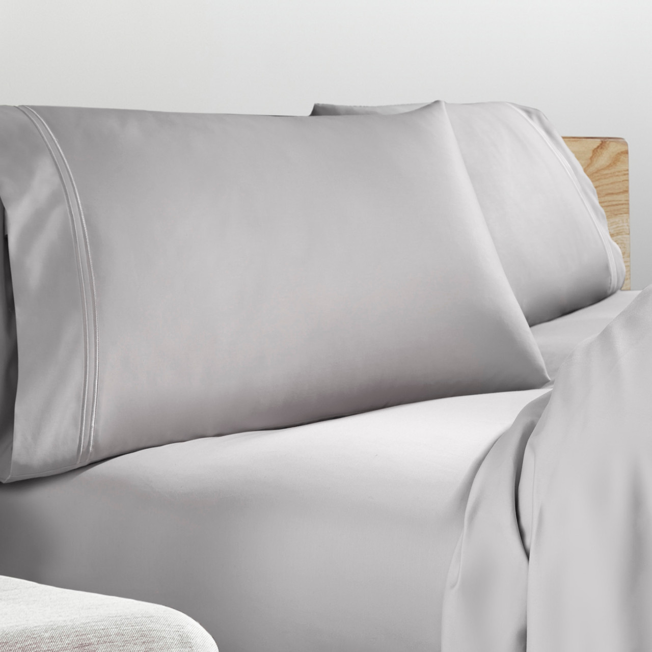 Refreshing TENCEL™ Lyocell Sheets by PureCare Split Head, Split Top, Flex Head Style Stacked Dove Gray Bed