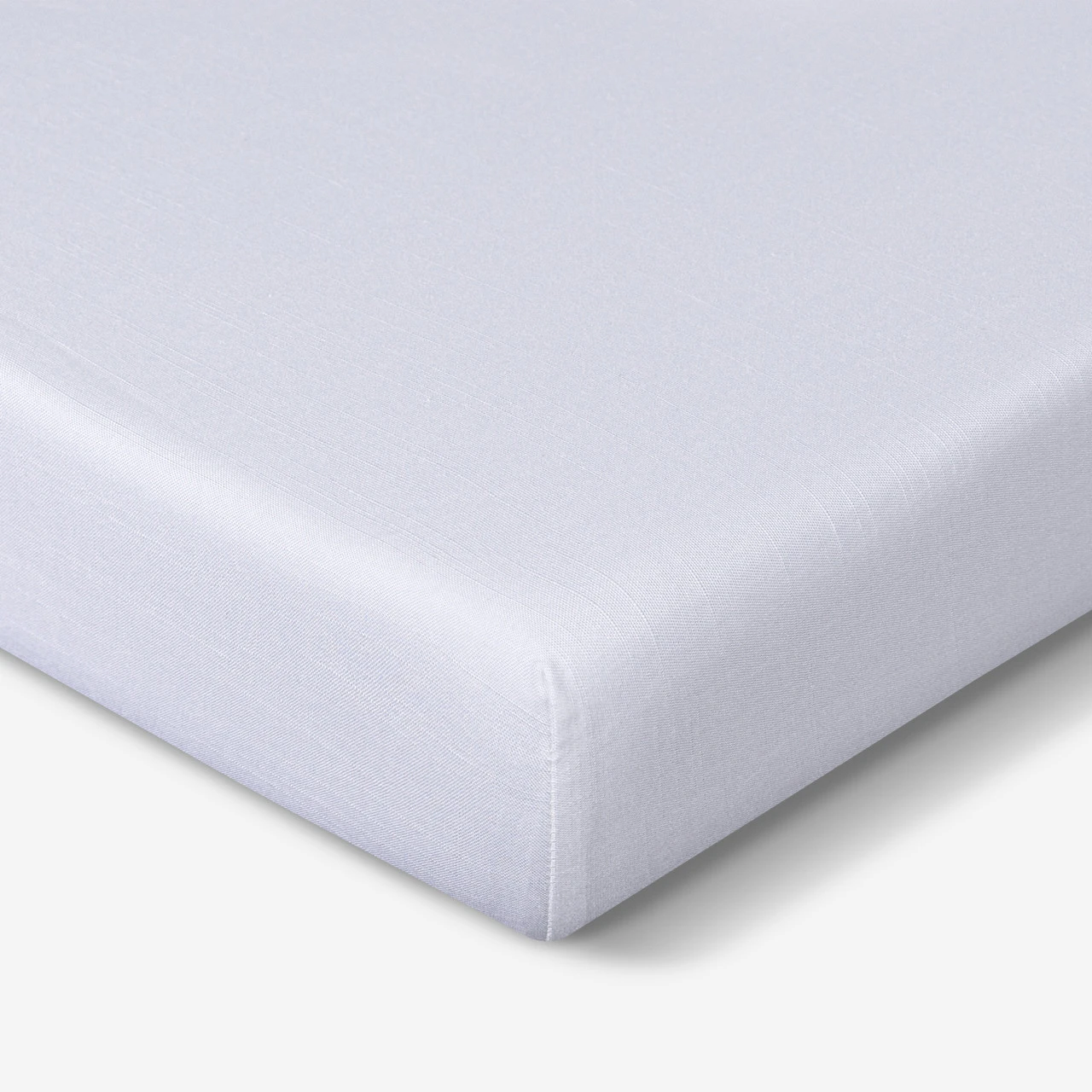 Crib Size - Bedgear Hyper-Linen Bamboo Blend Fitted Sheet On Mattress, Up Close Corner, White Color