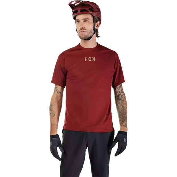 Brown and black short sleever jersey with cream logos